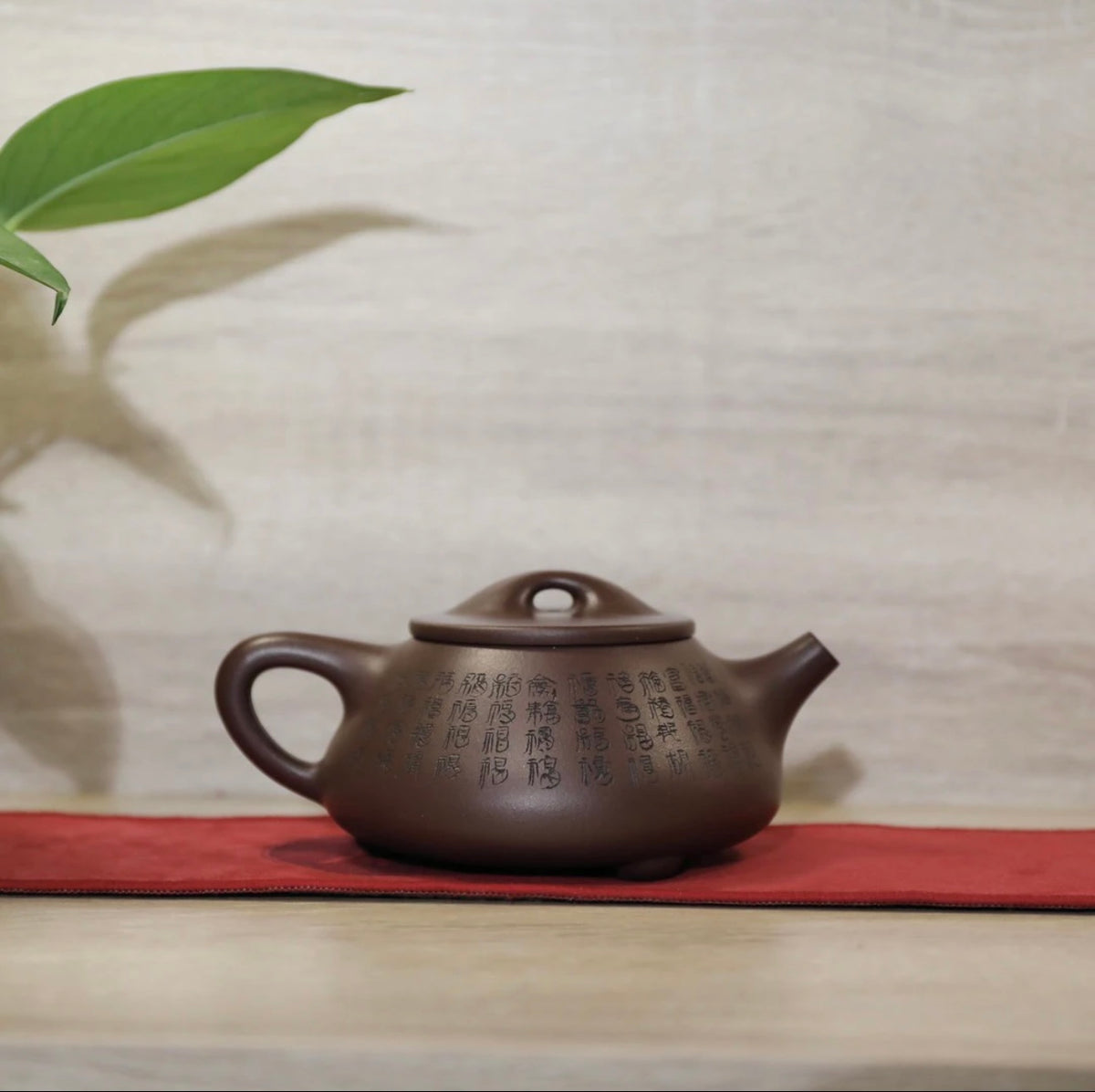 Purple clay teapot